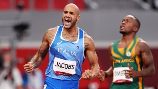  Lamont Marcell Jacobs of Team Italy celebrates after winning the Men's 100m Final