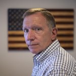 Retired NYPD Officer Ken Winkler, poses for a portrait in his office