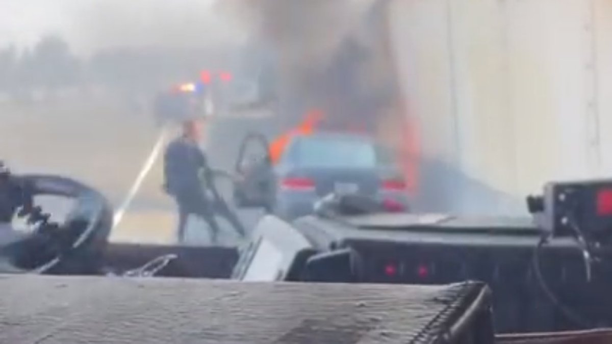 Video Shows Police Officer Save Driver From Burning Car – NBC Los Angeles