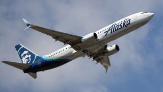 A Boeing 737-990 (ER) operated by Alaska Airlines takes off from JFK Airport on August 24, 2019 in Queens, New York.