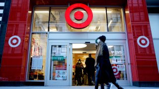 People walk in front of Target store on March 02, 2021 in New York.