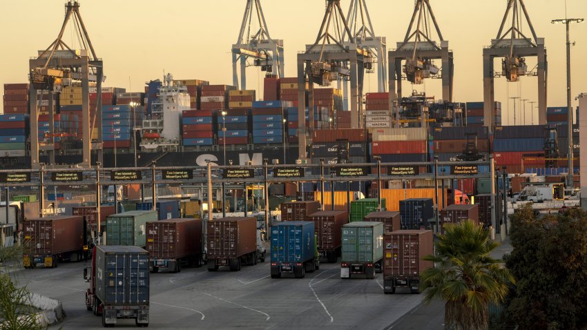 Cargo trucks parked at the Port of Los Angeles in Los Angeles, California, U.S., on Wednesday, Oct. 13, 2021.