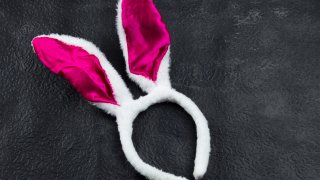 Photo illustration of white bunny ears.