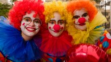 SANTA CRUZ DE TENERIFE, TENERIFE ISLAND, SPAIN - 2020/02/23: A group of women, dressed up as clowns and smiling, partying in the streets during the Daytime Carnival. (Photo by Frank Bienewald/LightRocket via Getty Images)