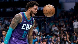 CHARLOTTE, NORTH CAROLINA – OCTOBER 25: Miles Bridges #0 of the Charlotte Hornets reacts after dunking against the Boston Celtics during the first half of their game at Spectrum Center on October 25, 2021 in Charlotte, North Carolina. NOTE TO USER: User expressly acknowledges and agrees that, by downloading and/or using this Photograph, user is consenting to the terms and conditions of the Getty Images License Agreement. (Photo by Grant Halverson/Getty Images)