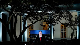 A video of Secretary of State Mike Pompeo speaking during the Republican National Convention plays from the Rose Garden of the White House, Tuesday, Aug. 25, 2020, in Washington.