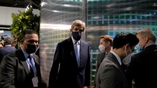 John Kerry, second left, United States Special Presidential Envoy for Climate leaves after a behind closed doors meeting with Brazilian representatives at the COP26 U.N. Climate Summit, in Glasgow, Scotland, Wednesday, Nov. 10, 2021. The U.N. climate summit in Glasgow has entered its second week as leaders from around the world, are gathering in Scotland's biggest city, to lay out their vision for addressing the common challenge of global warming.