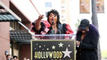 LOS ANGELES, CALIFORNIA - NOVEMBER 08: (L-R) Lizzo and Missy Elliott speak onstage during the Hollywood Walk of Fame Star Ceremony for Missy Elliot at Hollywood Walk of Fame on November 08, 2021 in Los Angeles, California. (Photo by Emma McIntyre/Getty Images)