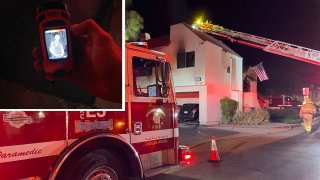 A thermal imaging camera (inset) is pictured at the site of a fire in Laguna Niguel.