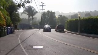 A man says four men tried to rob him near his Sherman Oaks home.