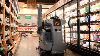 Cleaning robots scrub the floors of some grocery stores and membership club Sam’s Club. The software, made by Brain Corp., can also scan shelves for inventory.