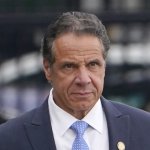 Former New York Gov. Andrew Cuomo prepares to board a helicopter after announcing his resignation, Aug. 10, 2021, in New York. The three-term Democratic governor stepped down in favor of his lieutenant governor, Kathy Hochul, as momentum built in the Legislature to remove him by impeachment.