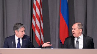 US Secretary of State Antony Blinken, left, and Russian Foreign Minister Sergey Lavrov meet on the sidelines of an Organization for Security and Co-operation in Europe (OSCE) meeting