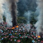 Smoke and fires erupt around Thantlang, in Chin State, Myanmar, Oct. 29, 2021. More than 160 buildings have been destroyed caused by shelling from Junta military troops, according to local media.
