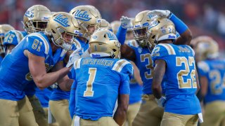 Members of the UCLA football team are pictured.