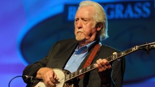 In this photo, J.D. Crowe performs during the 2012 IBMA Bluegrass fan fest at the on September 28, 2012 in Nashville, Tennessee.