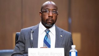 FILE - Sen. Raphael Warnock, D-Ga., listens during the Senate Judiciary Committee hearing on Jim Crow 2021: The Latest Assault on the Right to Vote on April 20, 2021.