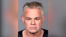 This Clark County Detention Center photo provided by the Las Vegas Metropolitan Police shows Eric Holland, 57, following his arrest Thursday, Dec. 23, 2021, in Las Vegas.