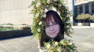 A portrait of Valentina Orianna Peralta, 14, is displayed in front of LAPD headquarters.