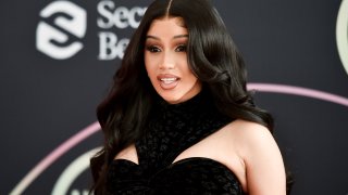 Cardi B poses for photos after the ceremonial red carpet roll out at the 2021 American Music Awards on Friday, Nov. 19, 2021, in Los Angeles.
