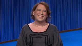 This image provided by Jeopardy Productions, Inc. shows game show champion Amy Schneider on the set of "Jeopardy!" Schneider is the first trans person to qualify for the show's Tournament of Champions.