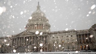 A winter storm delivers heavy snow to the Capitol in Washington, Monday, Jan. 3, 2022.
