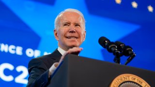 President Joe Biden speaks at the U.S. Conference of Mayors' 90th Annual Winter Meeting at the Capitol Hilton in Washington, Friday, Jan. 21, 2022.
