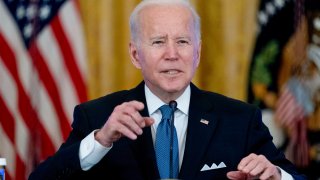President Joe Biden responds to reporter's questions during a meeting on efforts to lower prices for working families, in the East Room of the White House in Washington, Monday, Jan. 24, 2022.