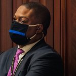 Capitol police officer Eugene Goodman watches newly released video footage of the January 6 attack on the Capitol Building during the second day of the impeachment trial of former President Donald Trump, Feb. 10, 2021, Washington, D.C.