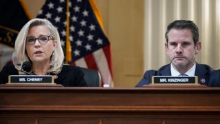 Rep. Liz Cheney (R-Wyo.), vice-chair of the select committee investigating the January 6 attack on the Capitol, and Rep. Adam Kinzinger (R-Ill.) listen during a committee meeting on Capitol Hill on Dec. 1, 2021, in Washington, D.C.