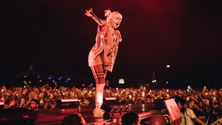 Billie Eilish performs on stage.