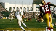 Miami Dolphins safety Jake Scott(13) intercepts a pass in the intended for Redskins Charley Taylor(42) in a 14-7 win over the Washington Redskins in Super Bowl VII on January 14, 1973 at Los Angeles Memorial Coliseum. Scott intercepted twice in this game and was also named MVP. (Photo by James Flores/Getty Images)