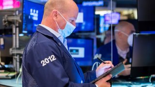 Traders on the floor of the NYSE, Feb. 9, 2022.