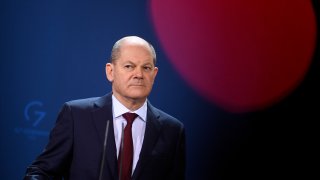 FILE – German Chancellor Olaf Scholz attends a press conference with the leaders of the three Baltic states, Lithuanian President Gitanas Nauseda, Estonian Prime Minister Kaja Kallas and Latvia Prime Minister Karins, ahead of consultations on Ukraine crisis, at the Chancellery, Berlin, Feb. 10, 2022.