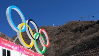 Olympic rings near the finish area of the alpine skiing course at the 2022 Winter Olympics, Wednesday, Feb. 2, 2022, in the Yanqing district of Beijing.