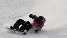 United States' Shaun White falls as he competes during the men's halfpipe qualification round at the 2022 Winter Olympics, Wednesday, Feb. 9, 2022, in Zhangjiakou, China.