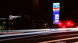Traffic passes a downtown Los Angeles gas station.