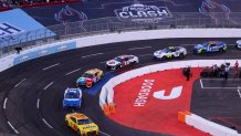 Los Angeles, CA - February 06: NASCAR racer Joey Logano, #22, leads the pack as they circle the quarter-mile track during the Busch Light Clash At The Coliseum, a NASCAR exhibition race at the historic LA Memorial Coliseum in Los Angeles Sunday, Feb. 6, 2022. Joey Logano, #22, went on to win the race. The season-opening Clash exhibition race gets a taste of West Coast flavor in 2022, marking a historic first visit to the tradition-rich Los Angeles Memorial Coliseum. The event was contested around a quarter-mile asphalt oval that was built around the facilitys football field. The Los Angeles event marks the first time the preseason Clash is held outside of Daytona International Speedway since its inception in 1979, and gives the sport its first competitive look at the Next Gen car on Feb. 6 in a non-points event, including a pre-race concert by Pit Bull and Ice Cube. (Allen J. Schaben / Los Angeles Times via Getty Images)