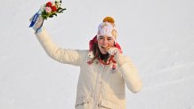 Gold medallist Slovakia's Petra Vlhova celebrates on the podium during the Women's Slalom victory ceremony at the 2022 Winter Olympics at the Yanqing National Alpine Skiing Centre in Yanqing, China on Feb. 9, 2022.