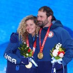 Gold medallists Lindsey Jacobellis and Nick Baumgartner of Team United States pose with their medals during the Mixed Team Snowboard Cross medal ceremony at the 2022 Winter Olympic Games, Feb. 12, 2022, in Zhangjiakou, China.