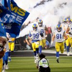 Los Angeles Rams players enter the field