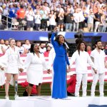 Mickey Guyton performs the national anthem