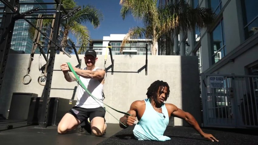 Zion Clark who is the Guinness World Record holder in the 20 meter walk on two hands and was a college wrestler, now has aspirations to qualify for the Olympics.