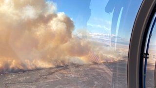 A wildfire burns in eastern California's Owens Valley.