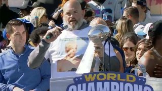 Andrew Whitworth holds the Lombardi Trophy as he wears a Cooper Kupp shift at the Super. Bowl victory parade Wednesday Feb. 16, 2022 in Los Angeles.