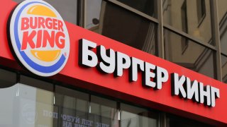 The Burger King name appears in Russian outside a Burger King fast food restaurant in Moscow, Russia, on Friday, April 5, 2013.