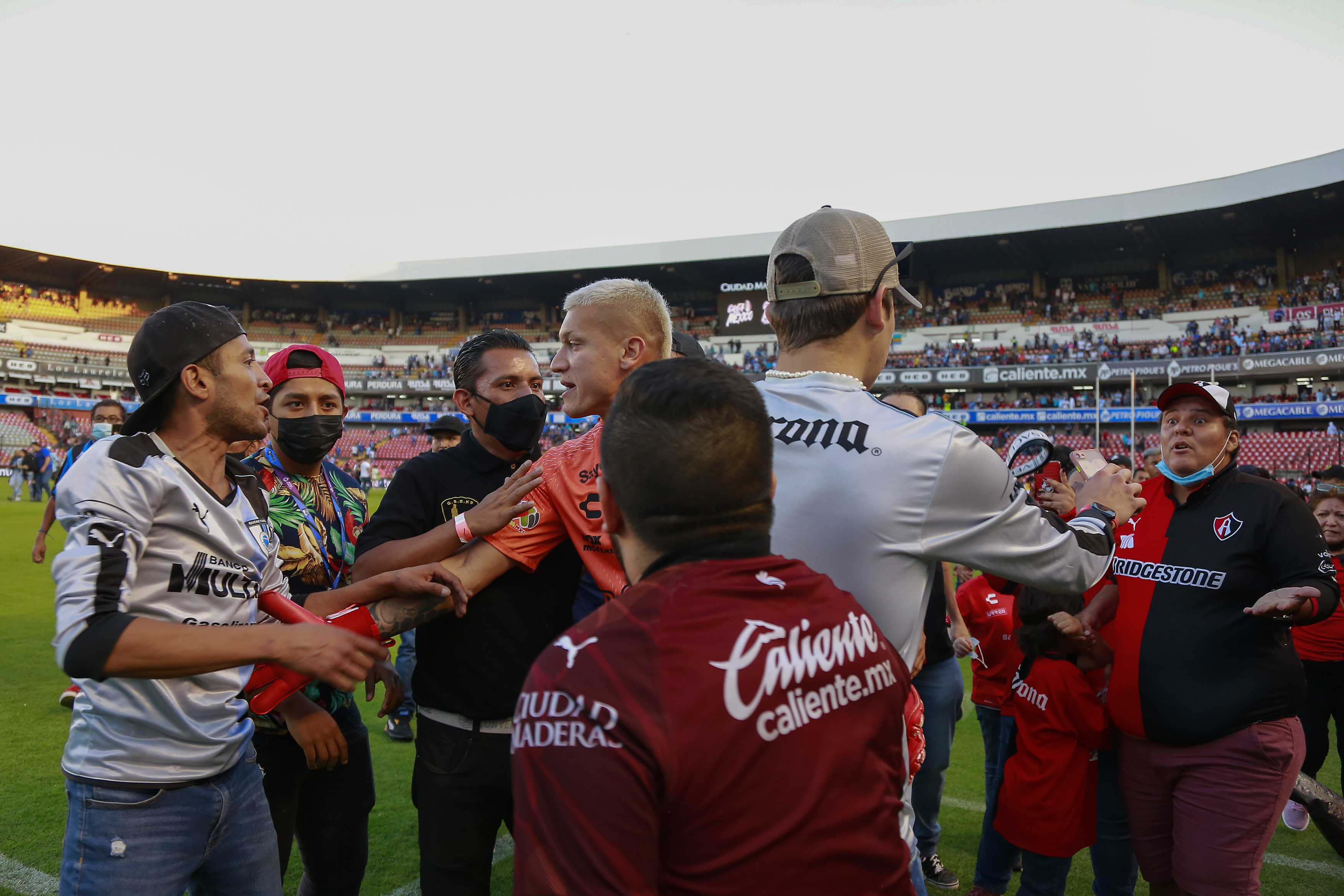 Five Mexican officials suspended over massive brawl among fans at soccer match