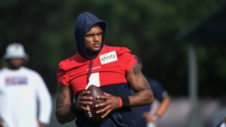 Texans quarterback Deshaun Watson (4) practices with the team during NFL football practice, Aug. 2, 2021, in Houston. Watson's complicated past didn't dissuade the Cleveland Browns from betting on the quarterback's future. He's on Cleveland's roster, and at this point that's the only certainty with the talented yet controversial QB. Watson's stunning trade to the Browns became official Sunday, March 20, 2022 capping a whirlwind few days during in which the three-time Pro Bowler — accused by 22 women of sexual harassment or assault — agreed to come to Cleveland after initially telling the team he wouldn't.