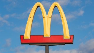 A view of a McDonald's food restaurant logo sign