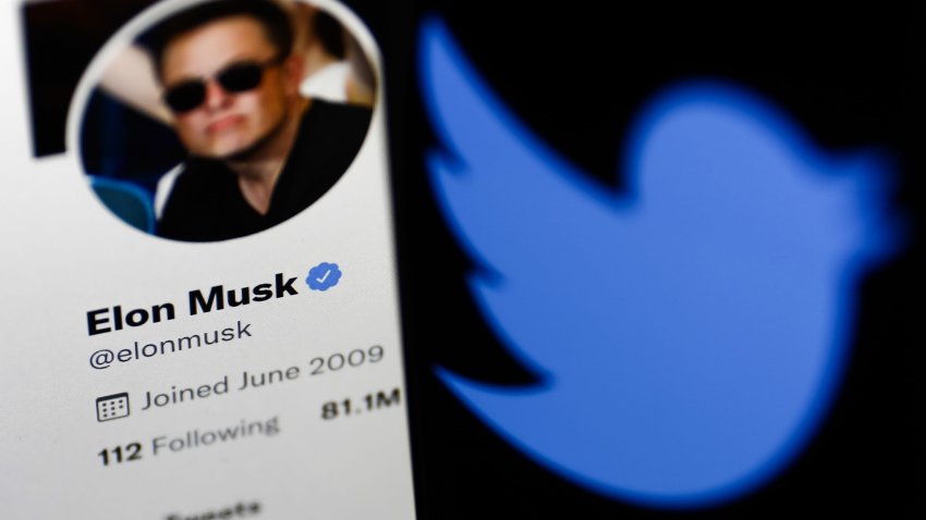 Elon Musk’s Twitter profile displayed on a computer screen and Twitter logo displayed on a phone screen are seen in this illustration photo taken in Krakow, Poland on April 9, 2022.